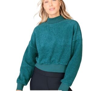 Fabletics Women’s Malia Polar Fleece Sweatshirt Size M Teal Pullover Crop Comfy